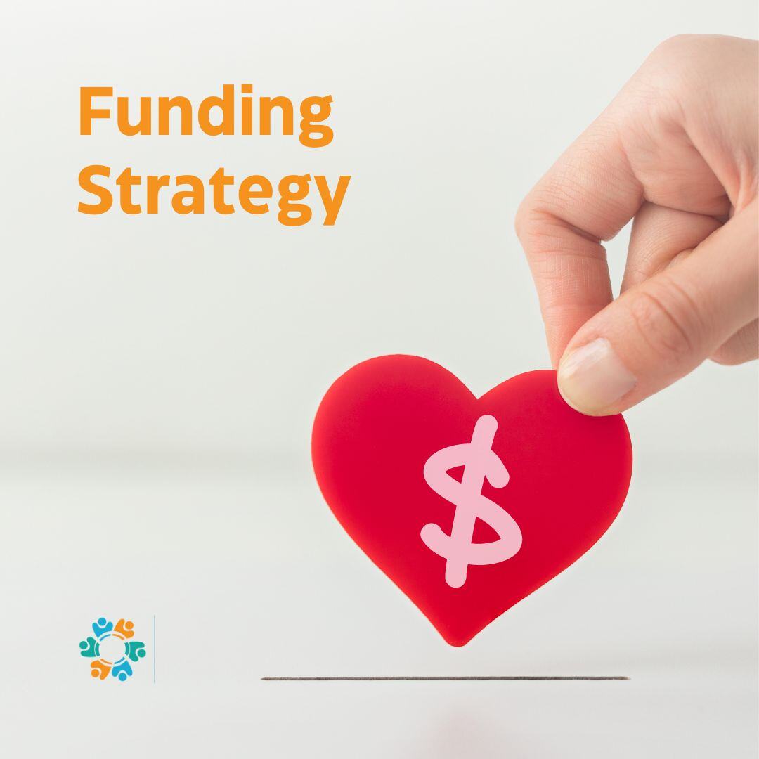 Hand putting heart felt dollars into donations